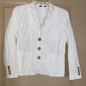 Women’s off white jacket.